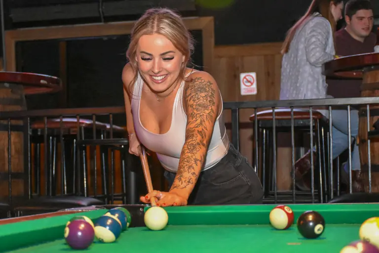 Rack 'em up and challenge your friends to a game of pool at Stampede Houston! Our pool tables are a favorite among Houston's nightlife crowd, offering hours of fun and friendly competition.