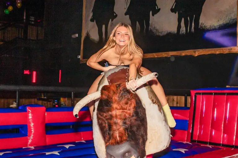 Saddle up and join the fun at Stampede Houston's mechanical bull! #NightclubFun #HoustonNightlife #StampedeHouston