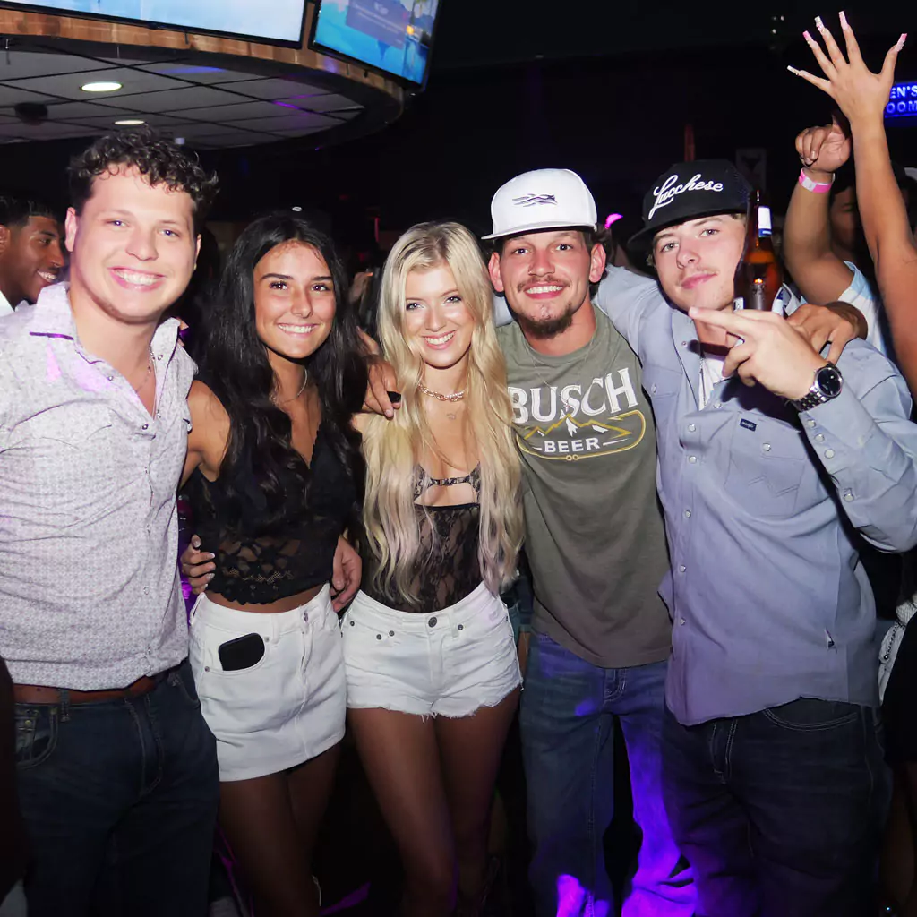 Friends celebrating at Stampede Houston nightclub